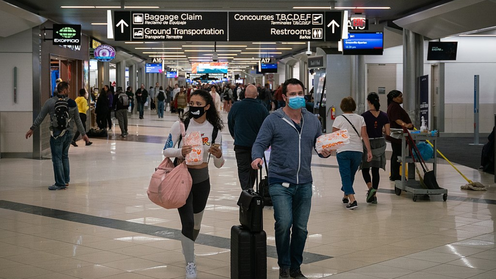 Flyers at Hartsfield-Jackson Atlanta International Airport wearing facemasks on March 6th, 2020 as the COVID-19 coronavirus spreads throughout the United States.